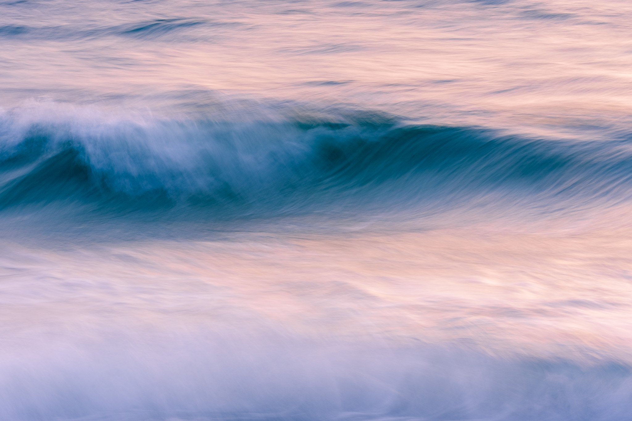 Sunlit Ocean Horizon Wave