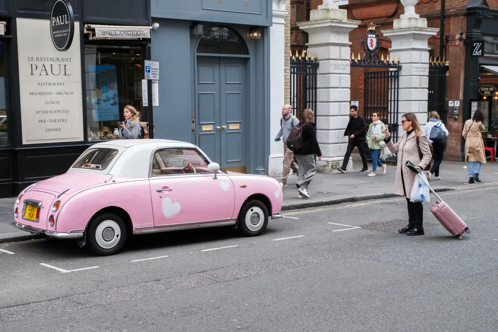 Pink Convertible on the Road