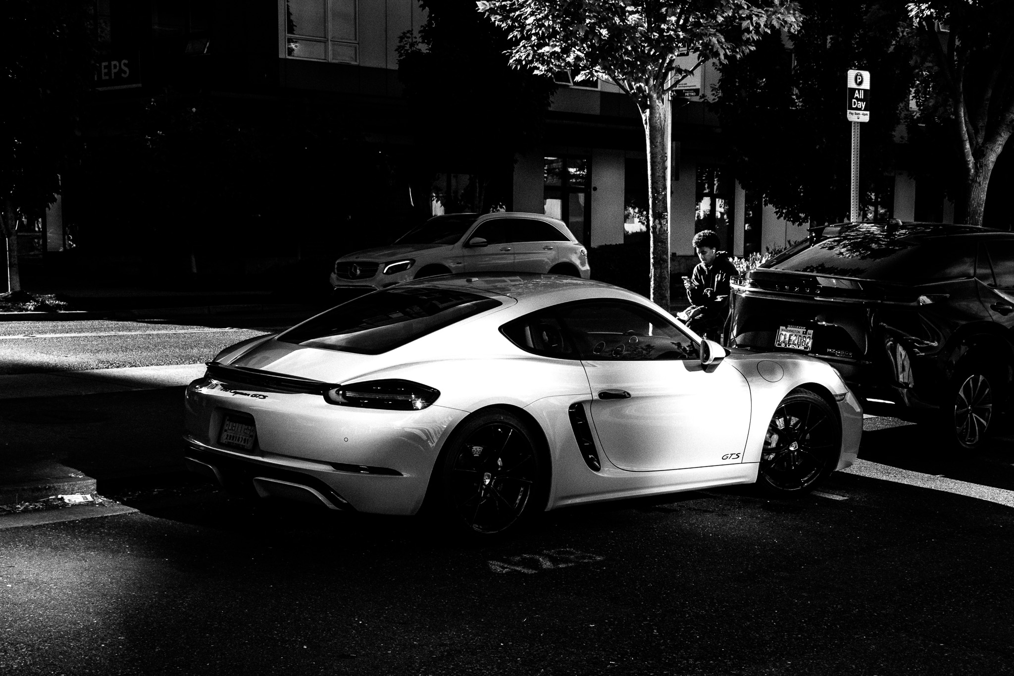 Row of parked luxury cars