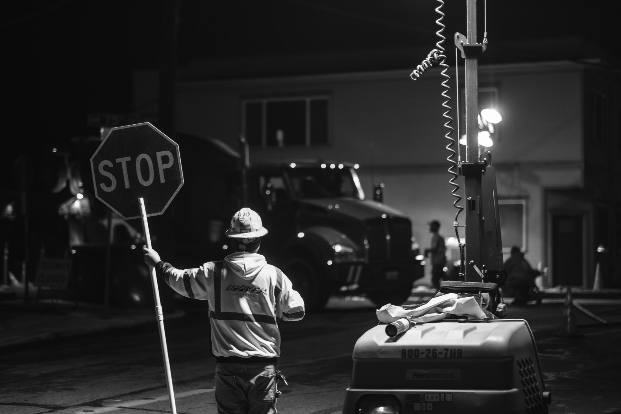 Construction Worker Directs Traffic