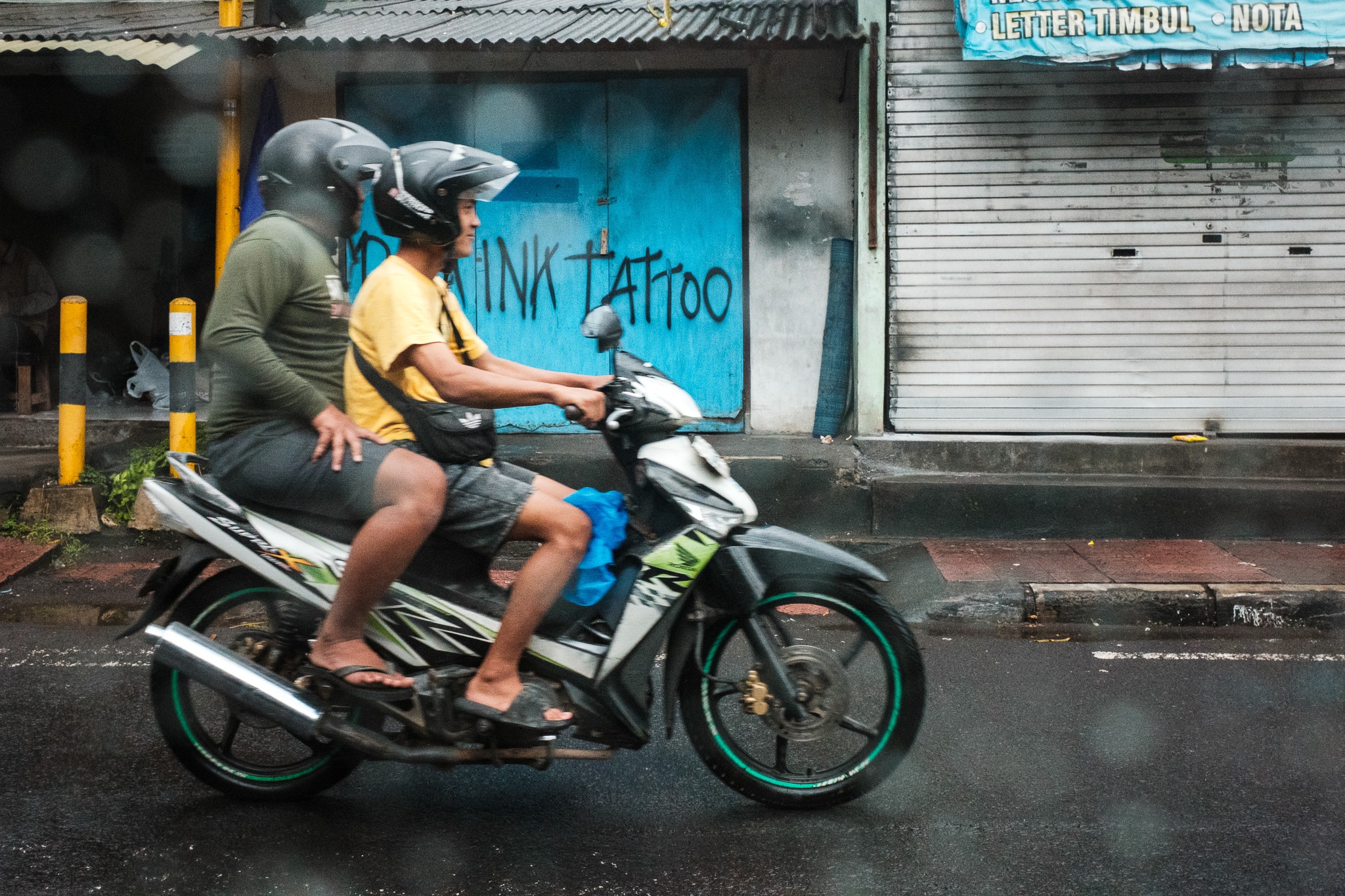 Rainy Ride Through Urban Streets