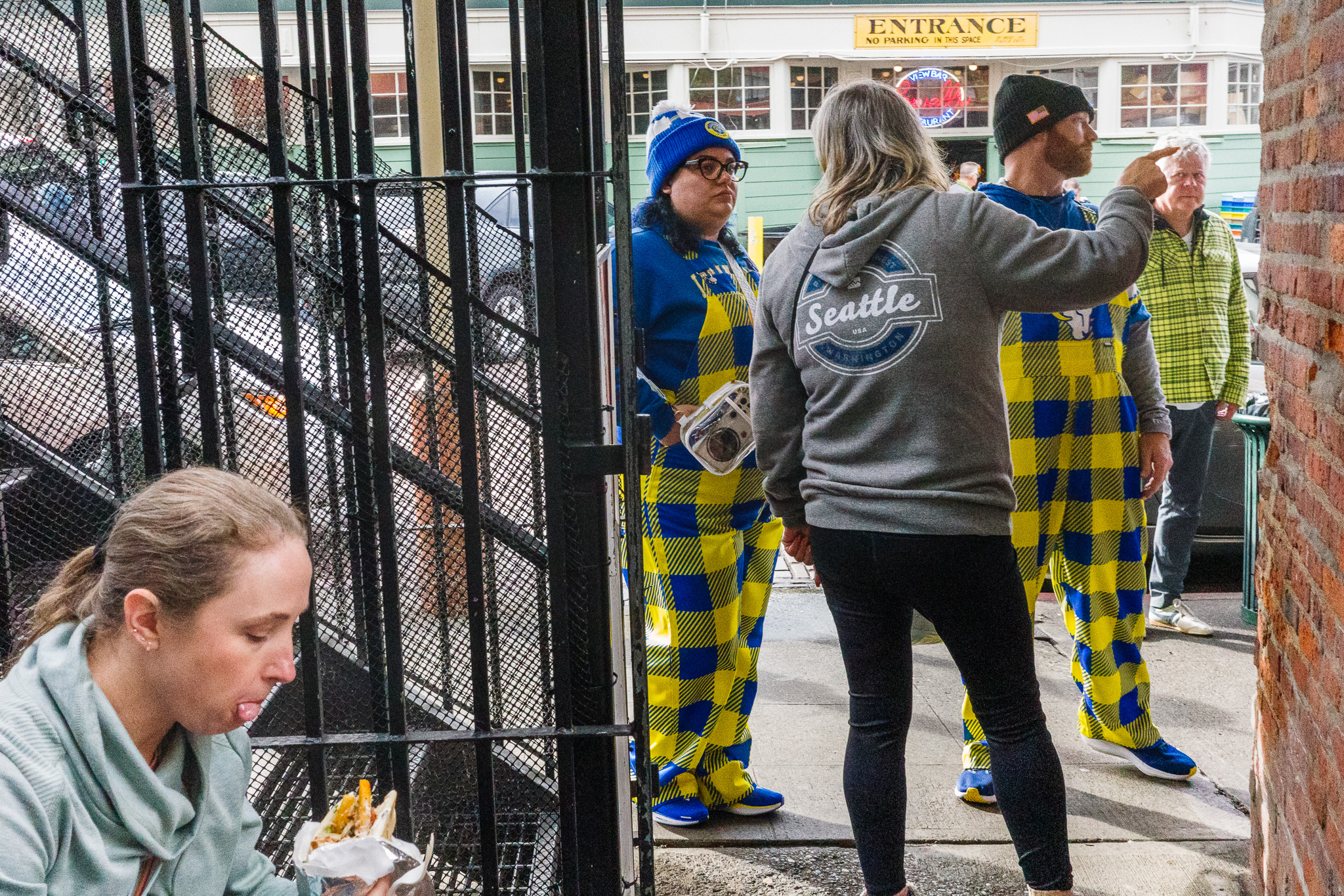 People in Plaid Outfit Walking