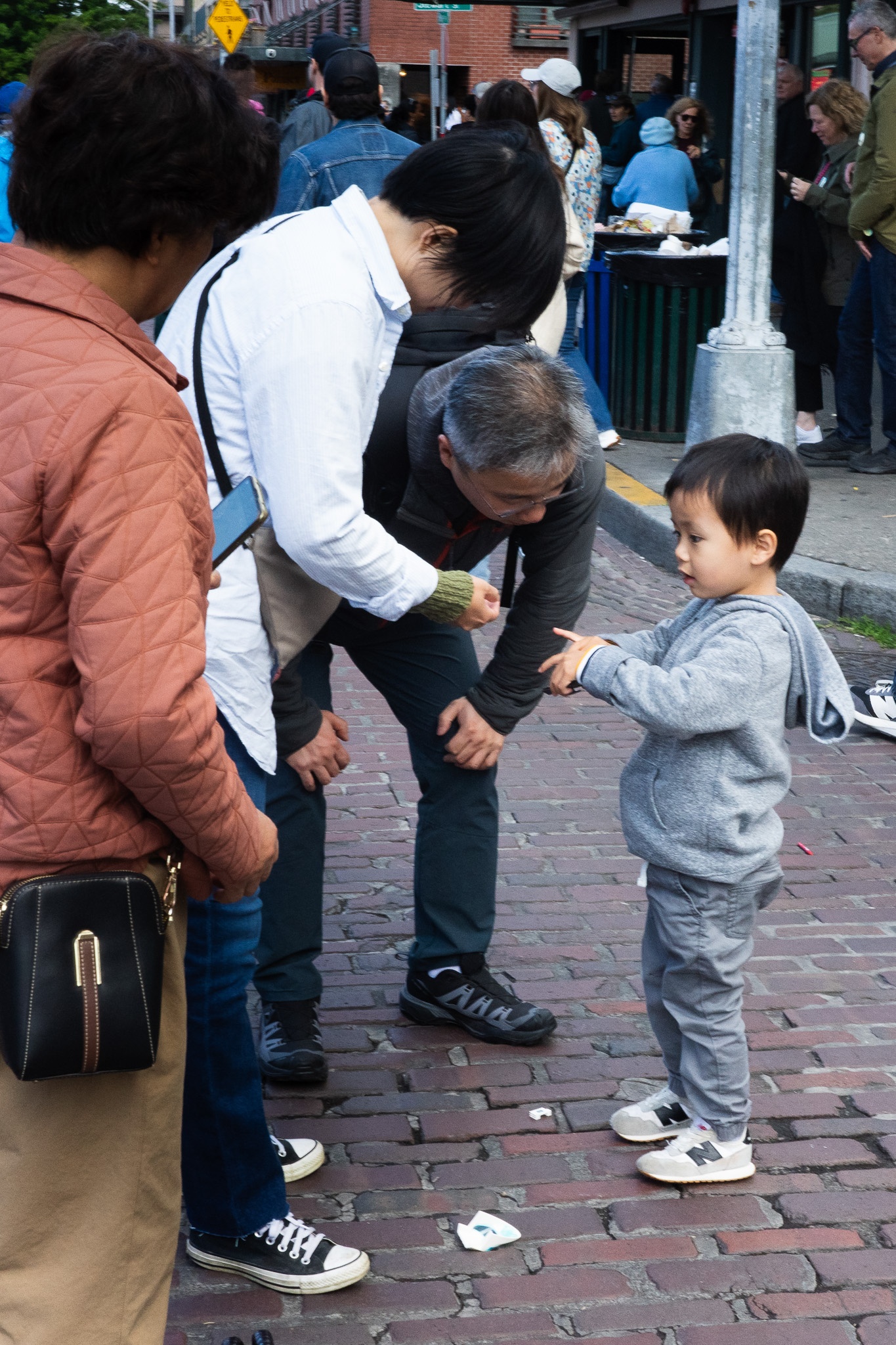 Curious Child in the Crowd