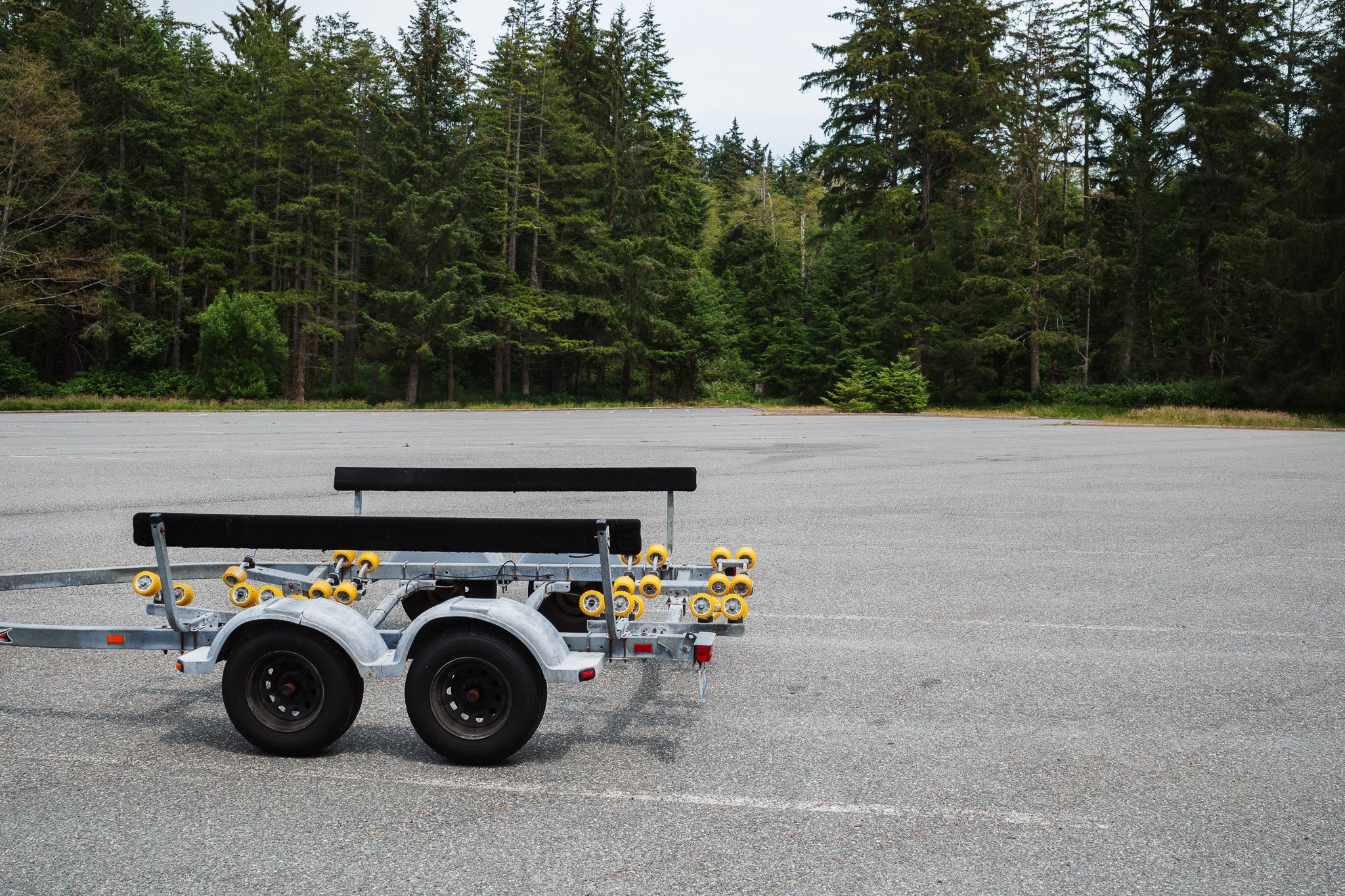 Boat trailer in parking lot