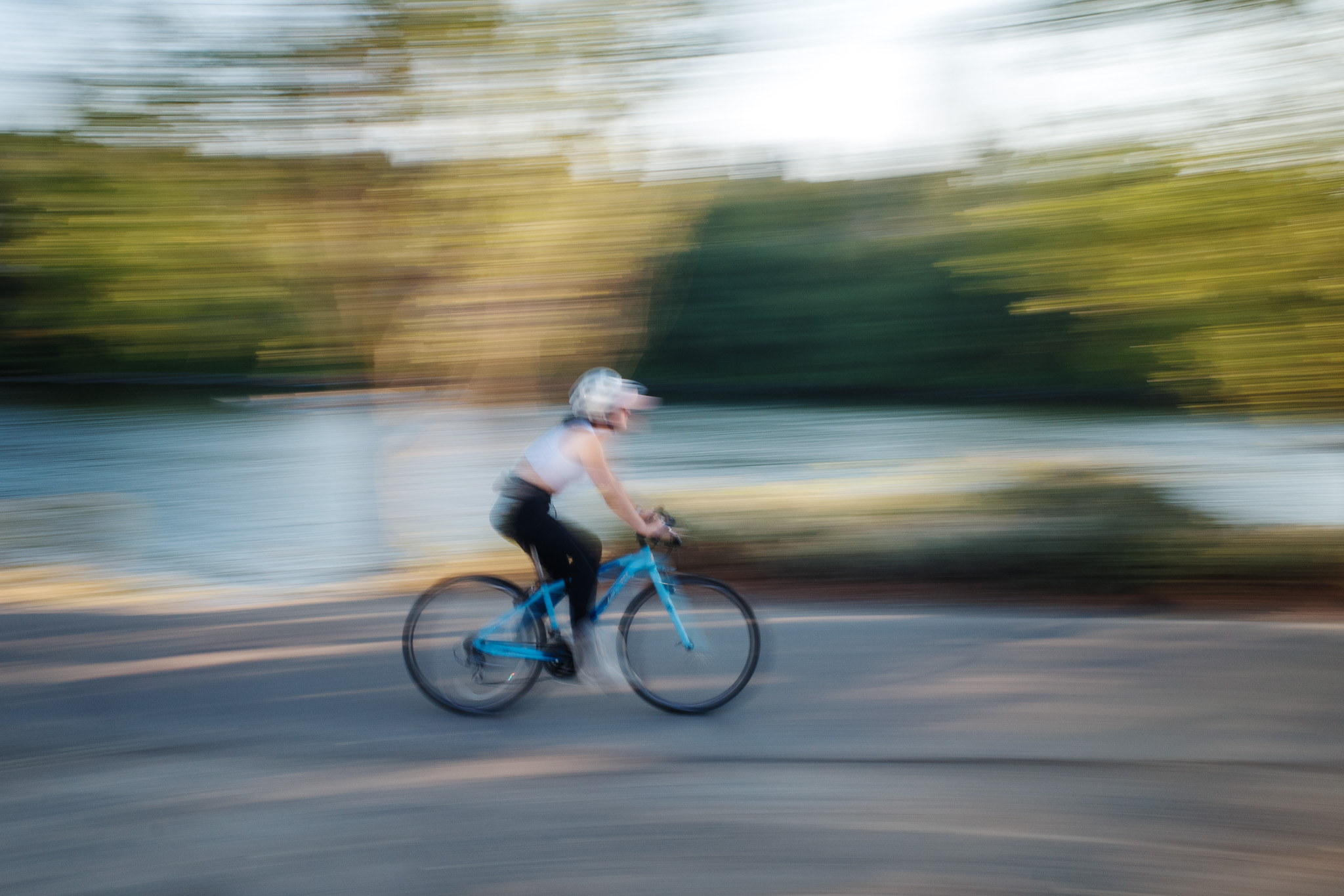 Woman Riding Down the Road