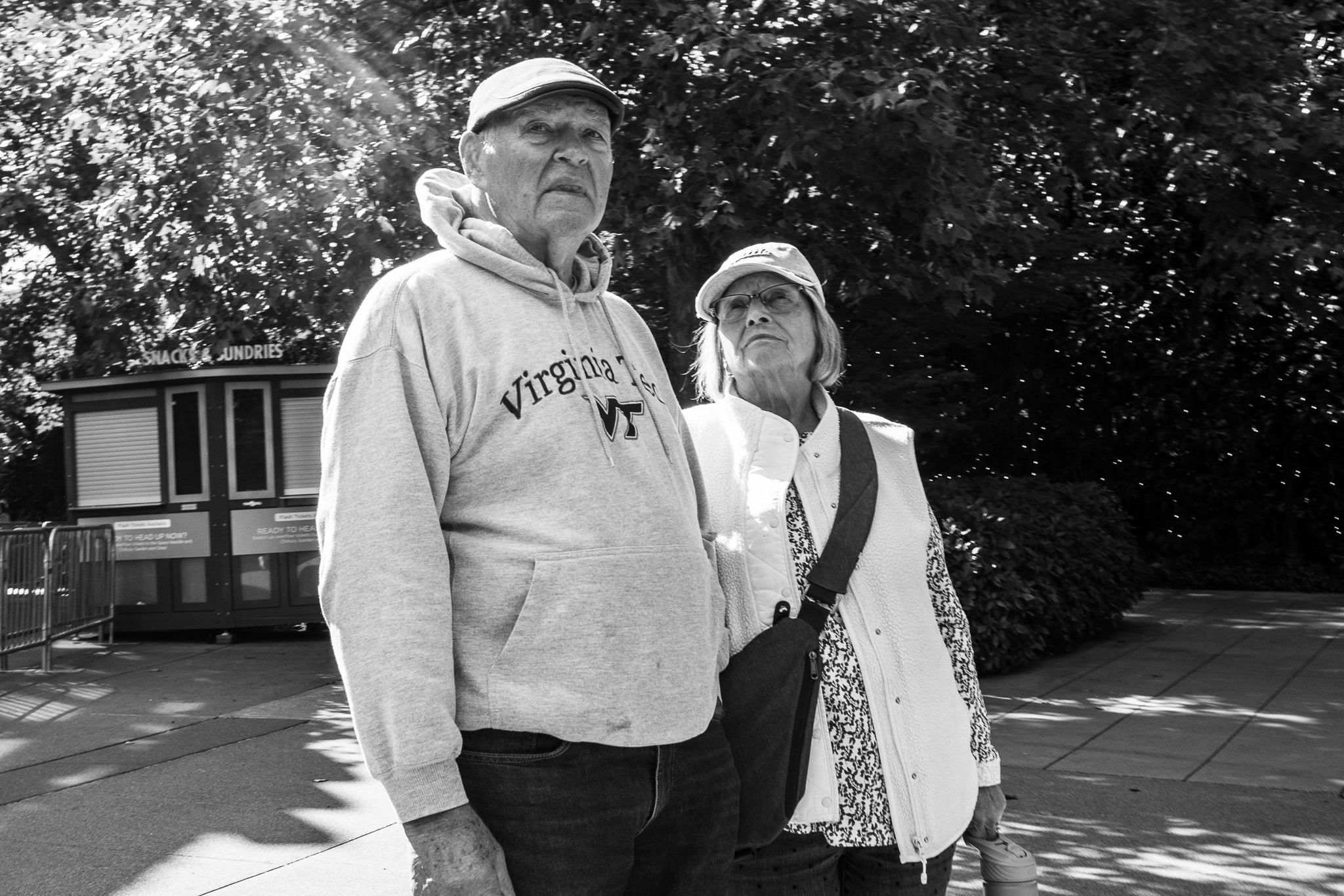 Serious Couple on the Sidewalk