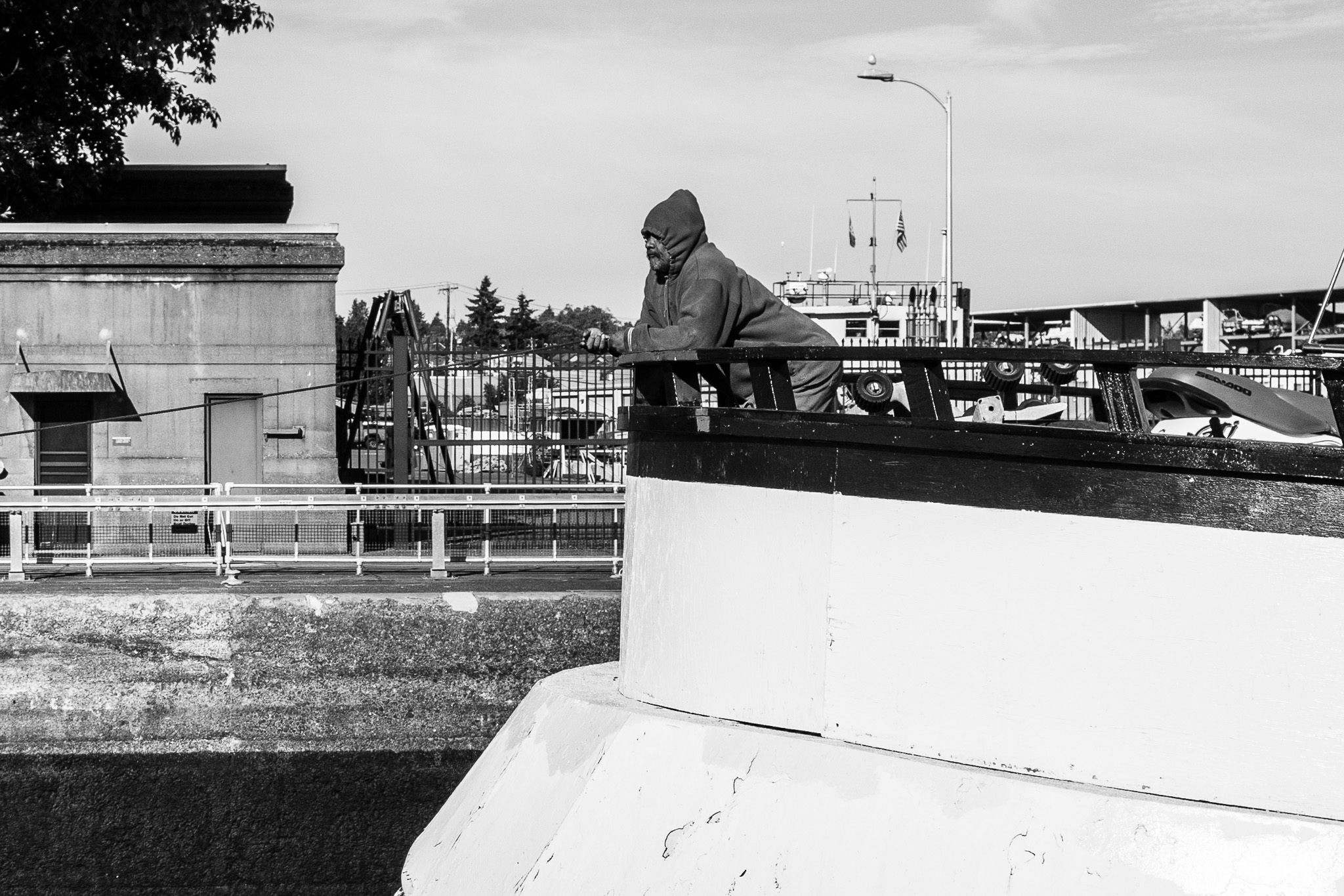 Man's contemplative waterfront moment